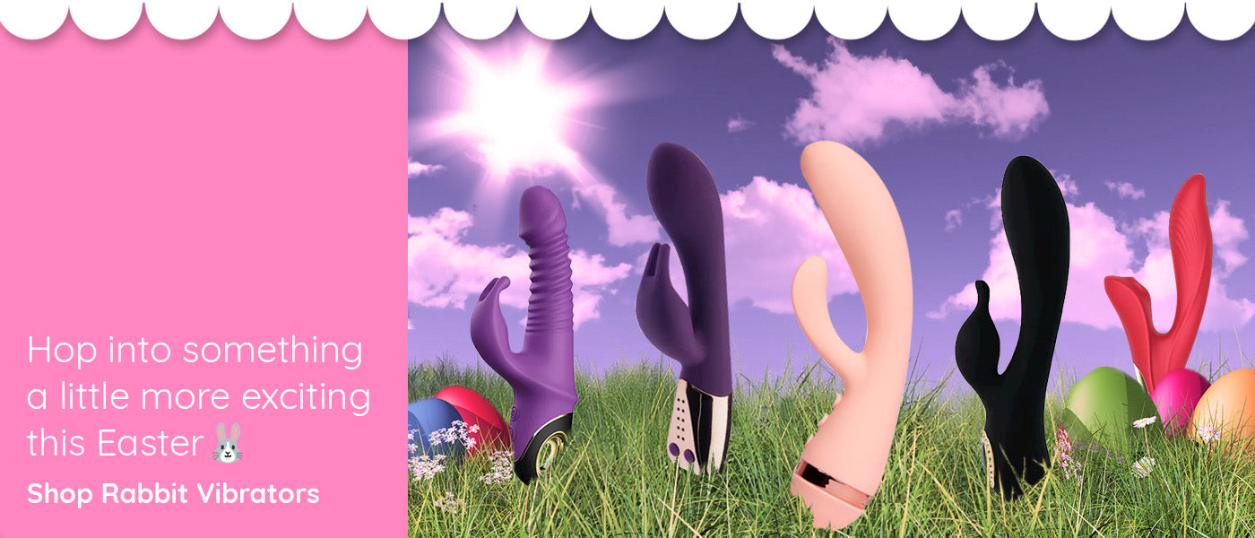 Rabbit vibrators in various colors on grass with Easter eggs and sky background