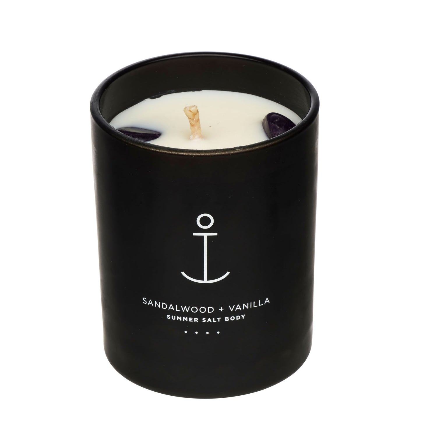 Sandalwood and Vanilla soy candle - rose quartz. Black candle jar with a white candle inside on a white background